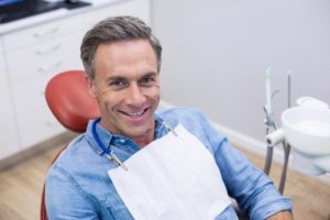 Dental patient smiling after receiving anesthesia-free fillings in Pasadena